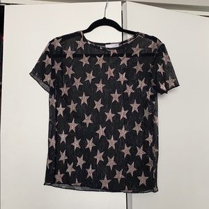 Sheer short sleeve top with star pattern